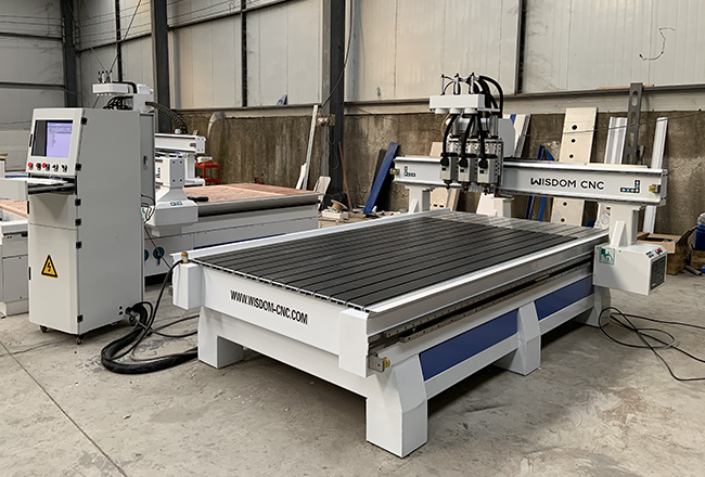 Why choose three changing heads wood engraving cnc router